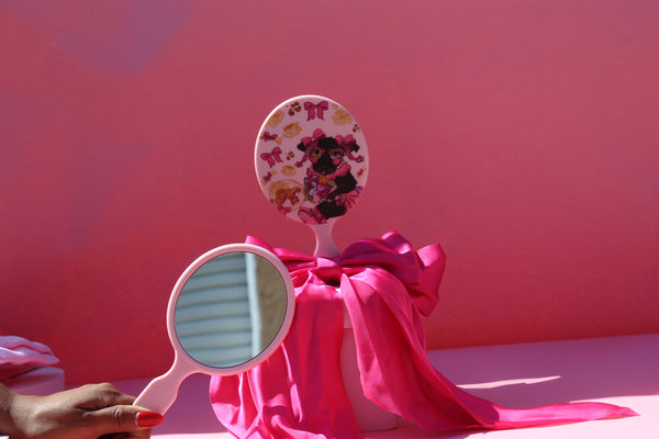Hand held coquette mirror