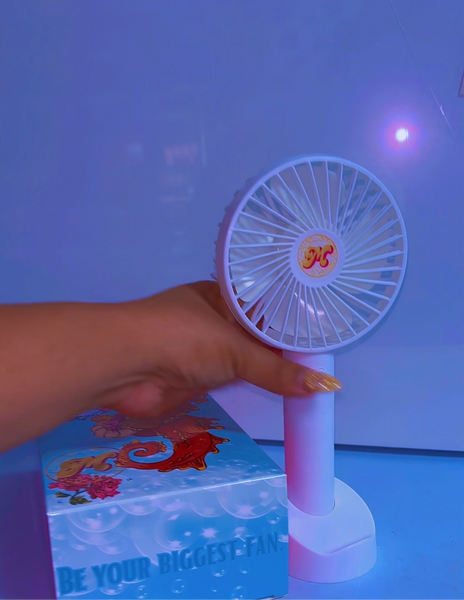 I’m your fan, handheld fan.