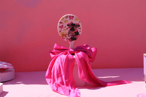 Hand held coquette mirror
